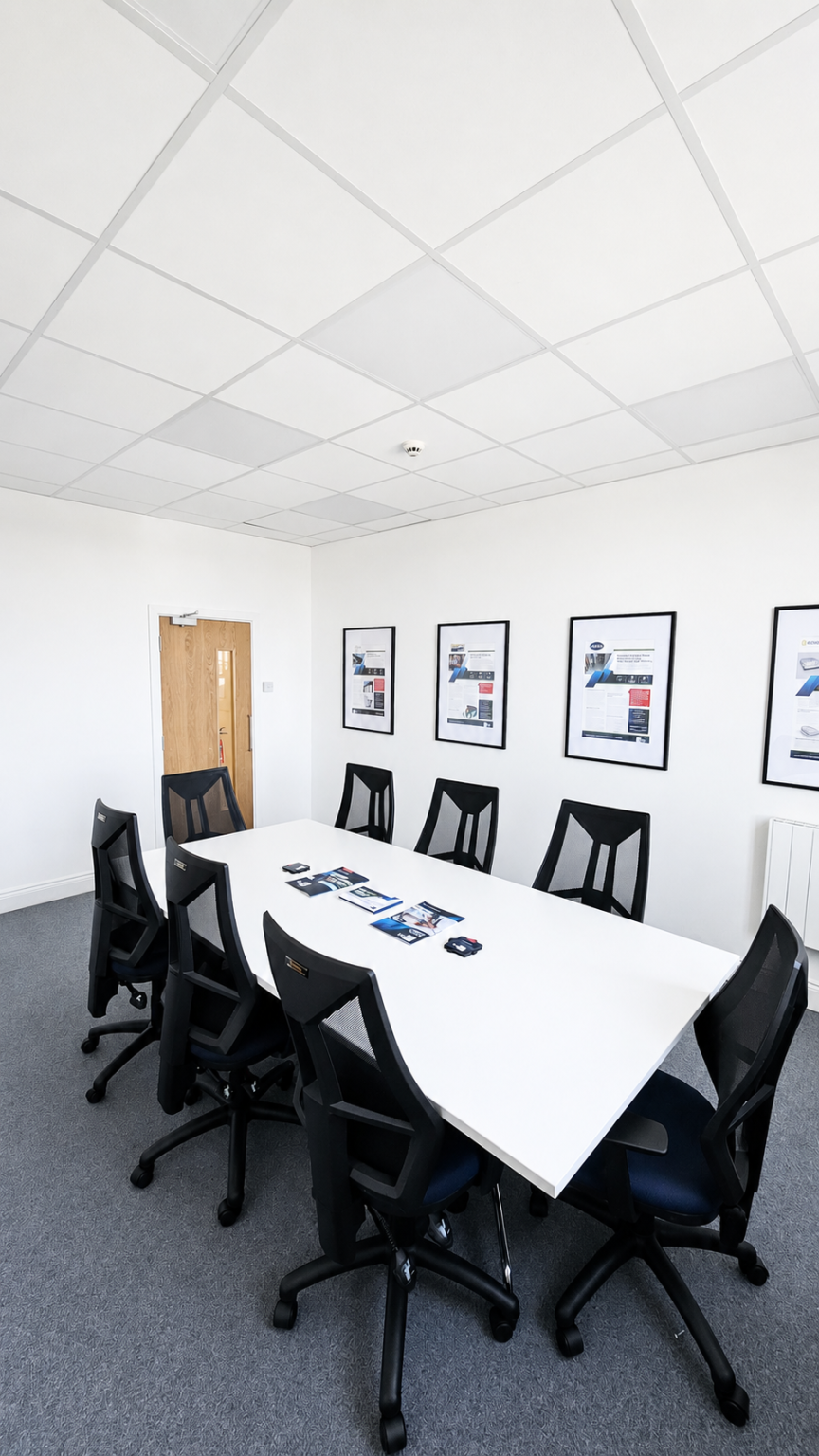 Refurbished commercial meeting room with new carpet and fire door