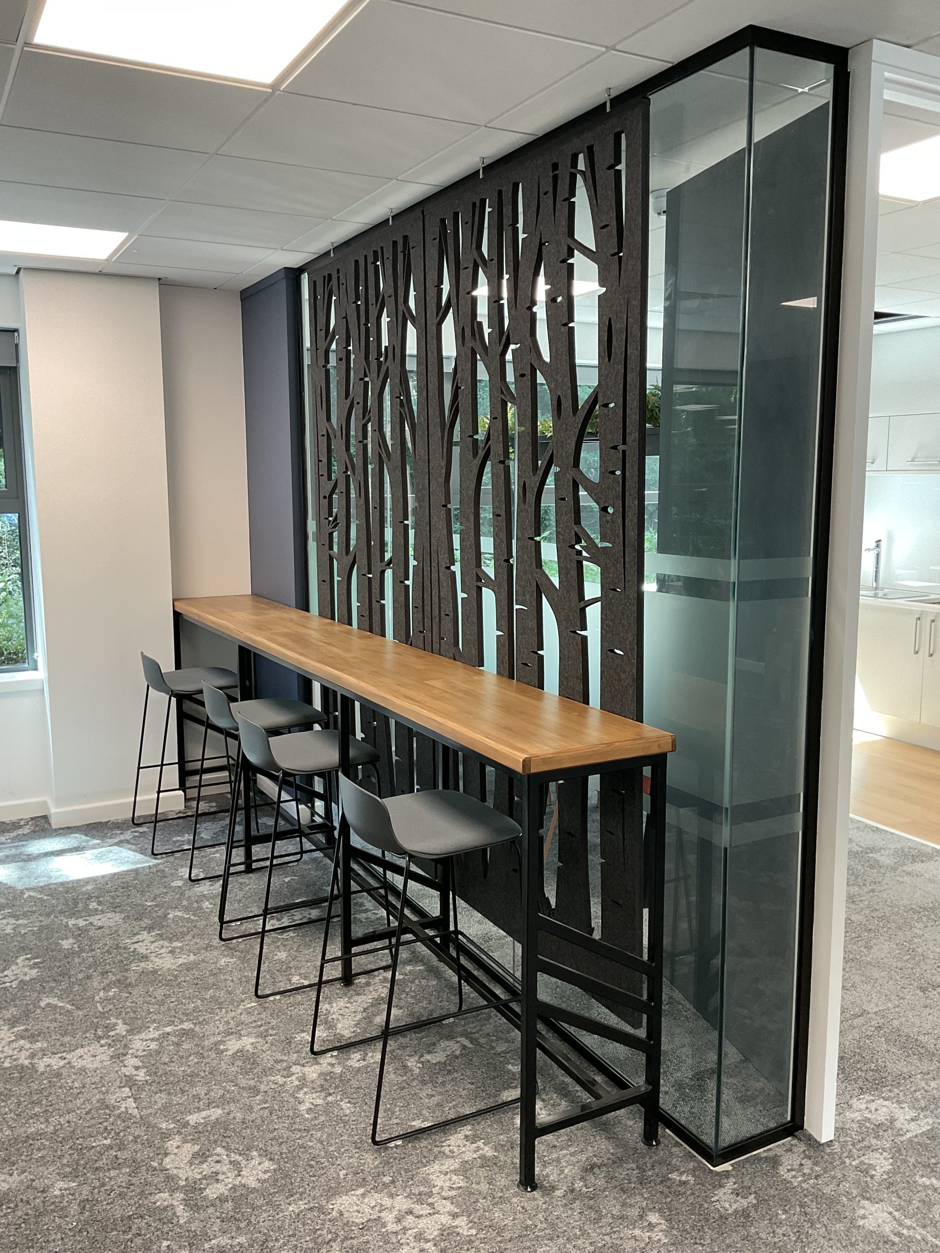 Bespoke high bench table with acoustic screen for office breakout space